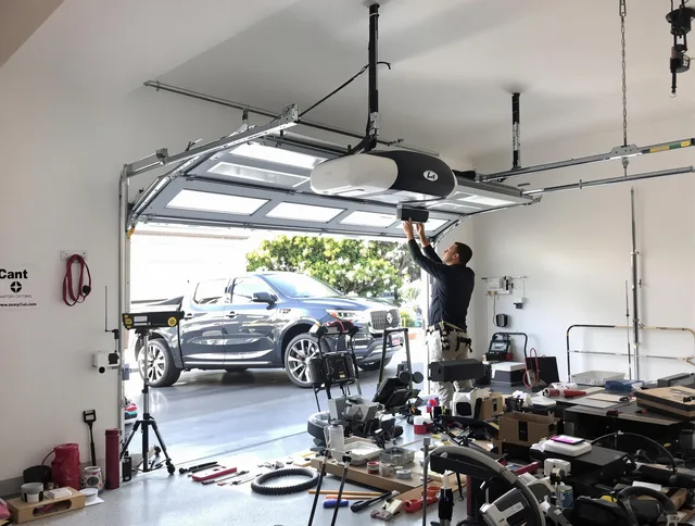 Bridgeport Garage Door Repair specialist installing smart garage door opener system in Bridgeport home
